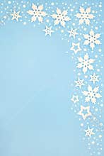 Abstract Christmas Snowflake Background Border on Pastel Blue