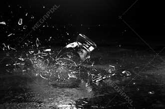 A glass breaking on the ground