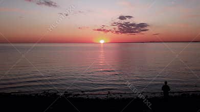 Red sunsets over sea video