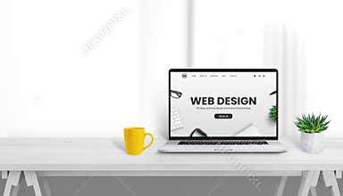 Web design studio promo web site on laptop display