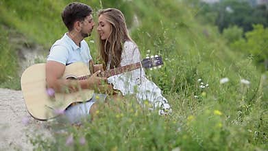 Young Couple In Love At Romantic Date In Nature