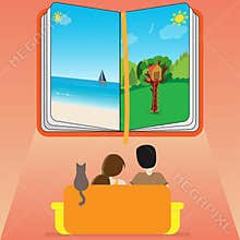 Family sitting on a sofa and looking at an open book with landscapes