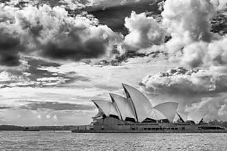 Beautiful view of the Sydney Opera House in black and white against a dramatic sky, Australia