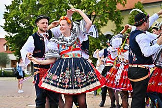 Brno - Bystrc, Czech Republic, June 22, 2019. Traditional Czech feast. Folk Festival. Girls and boys dancing in beautiful costumes