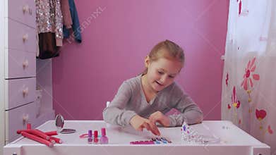 Happy Little Girl And Cosmetics