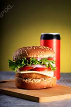 Fast Food Burger with a Cold Drink Can