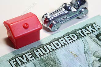Part of Bangladeshi currency or taka and toy house, car