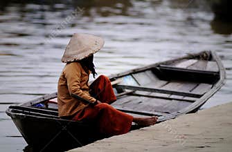 Boatman with Conical hats in Vietnam