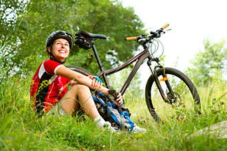 Young Woman riding bicycle
