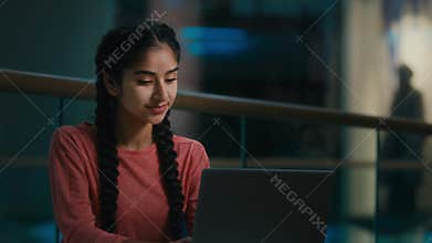 Beautiful female professional user woman doing online job sit in business office young student freelancer browsing