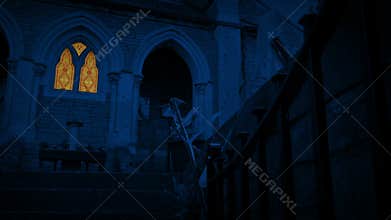 Bunting Flaps In Breeze By Church At Night