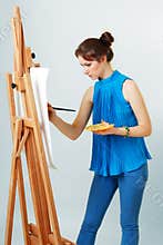 Women painter with easel