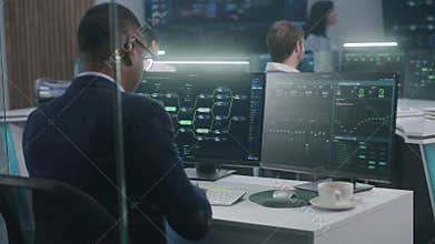 Big data scientist works in monitoring room