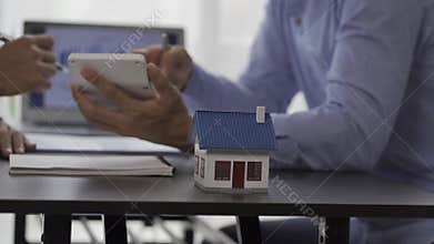 Home Sales Agents Introduce Buying Contracts and Calculate Interest Rates to Clients Real Estate Concepts 4k Video