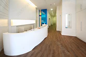 Lit reception area in dental clinic.