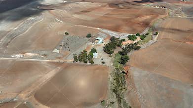 view of Abandoned old farm house amongst the dry cropping country with terrain in a sunny weather