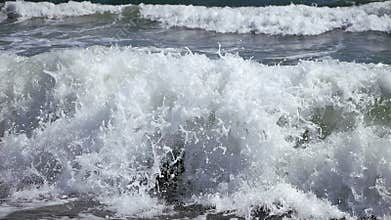 Boy dive into a foaming wave. Live a healthy life. Be H3althy