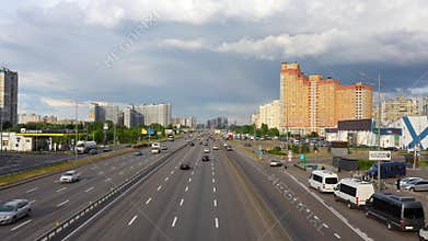 Kyiv, Ukraine - May 19, 2025: Intercity Buses at Poznyaky Metro Station With Traffic on Bazhana Avenue