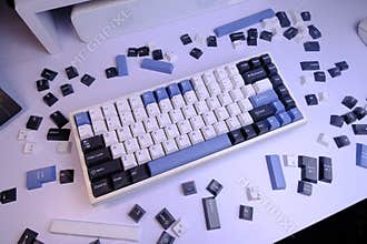 Modern 75% Layout Mechanical Keyboard with White, Blue, and Black Keycaps on a Clean White Desk