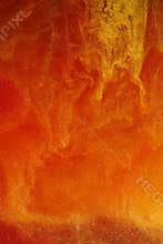 Abstract gold glitter on red