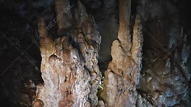 A cave with stalagmites and stalactites.