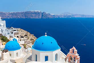 The most famous church on Santorini Island, Crete, Greece. Bell tower and cupolas of classical orthodox Greek church