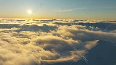 Snow mountains peak clouds sun sunset aerial winter landscape nature