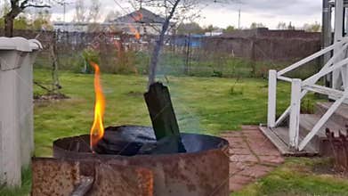 Charcoal starter to start a fire for outdoor barbecue.