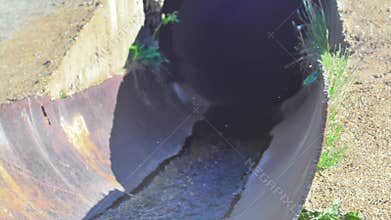 Dirty water dumping in the city into the river in 4K