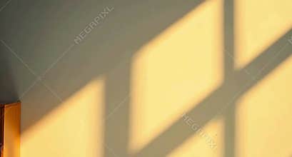 Soft window shadow cast gently inside a quiet bright room