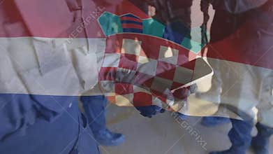 Officer lifting riot helmet initiating safety check, rotating visor testing fit and securing strap