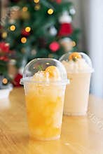 Refreshing fruit drinks in clear cups, perfect for warm days or festive gatherings, showcasing vibrant colors and textures