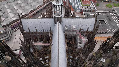 Aerial drone video footage Famous Cologne Cathedral, symbol of the city of Cologne. Flight between the cathedral towers.