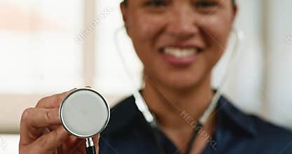 Friendly Doctor or Nurse Holds a Stethoscope and Smiles, Ready for a Checkup: Healthcare, Medical Exam, Patient Care