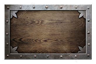 Old metal frame over wooden background