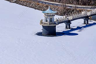 Early Spring Snow - Water Release Tower Landscape at Jingyuetan National Forest Park, Changchun, China