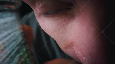 Macro Human Skin Texture on Face of Man with Closed Eye Resting