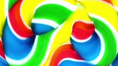 Close view of a vibrant lollypop spinning in circles