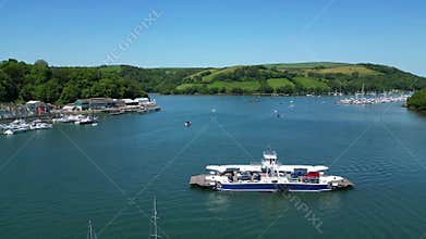 River Dart, South Devon, England: DRONE VIEWS: The Higher Ferry crosses the River Dart heading for the town of Dartmouth