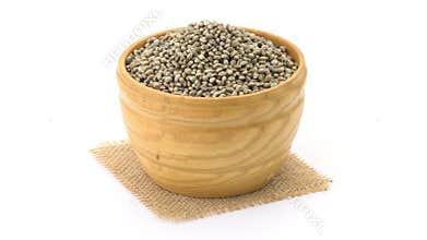 Wooden bowl with hemp seeds