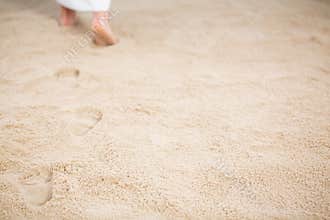 Jesus leaving footprints in sand