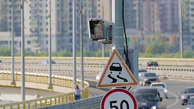 Radar speed control camera and signs on the road