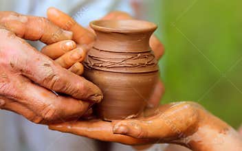 Closeup pot sculpted in clay