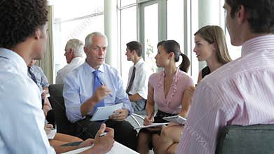 Groups Of Businesspeople In Brainstorming Meetings