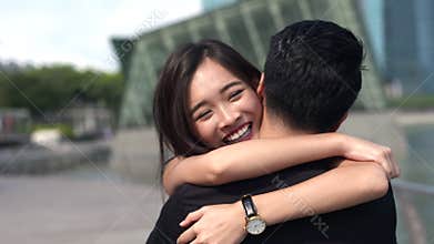 Asian girl running to meet her boyfriend