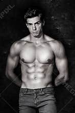 Italian model muscular man. Nude portrait. Black and white