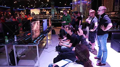 Gamers playing video games, annual Mortal Kombat tournament