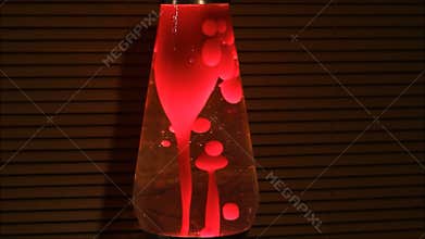 Lava lamp. Red Blobs in the dark.