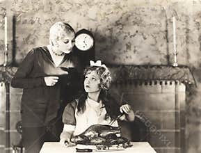 Woman getting advise on turkey carving