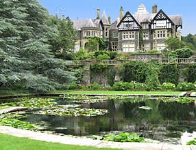 Manor house and pond at Bodnant Garden